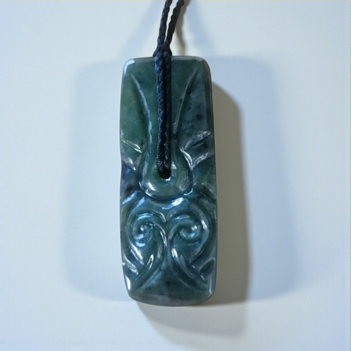 Carved Toki Pendant