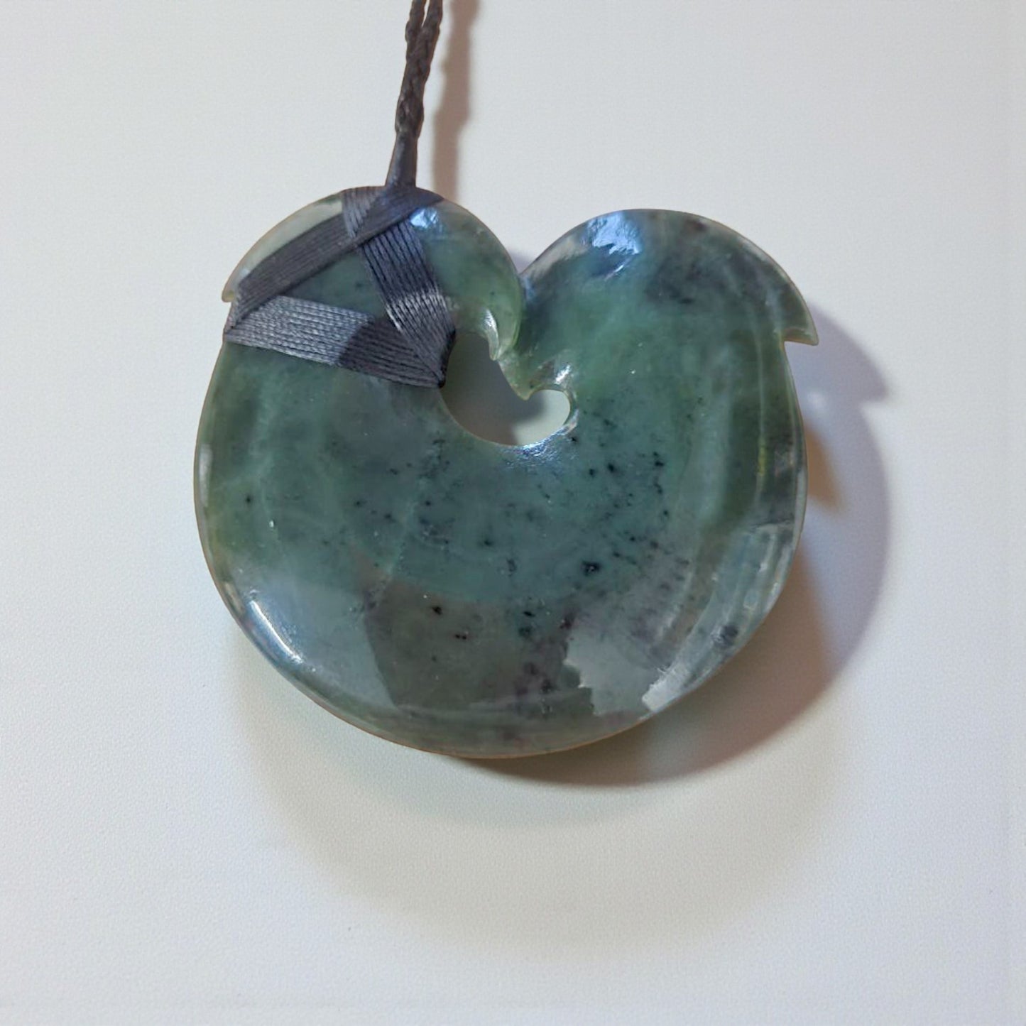 Polished Contemporary Hei Matau Pendant