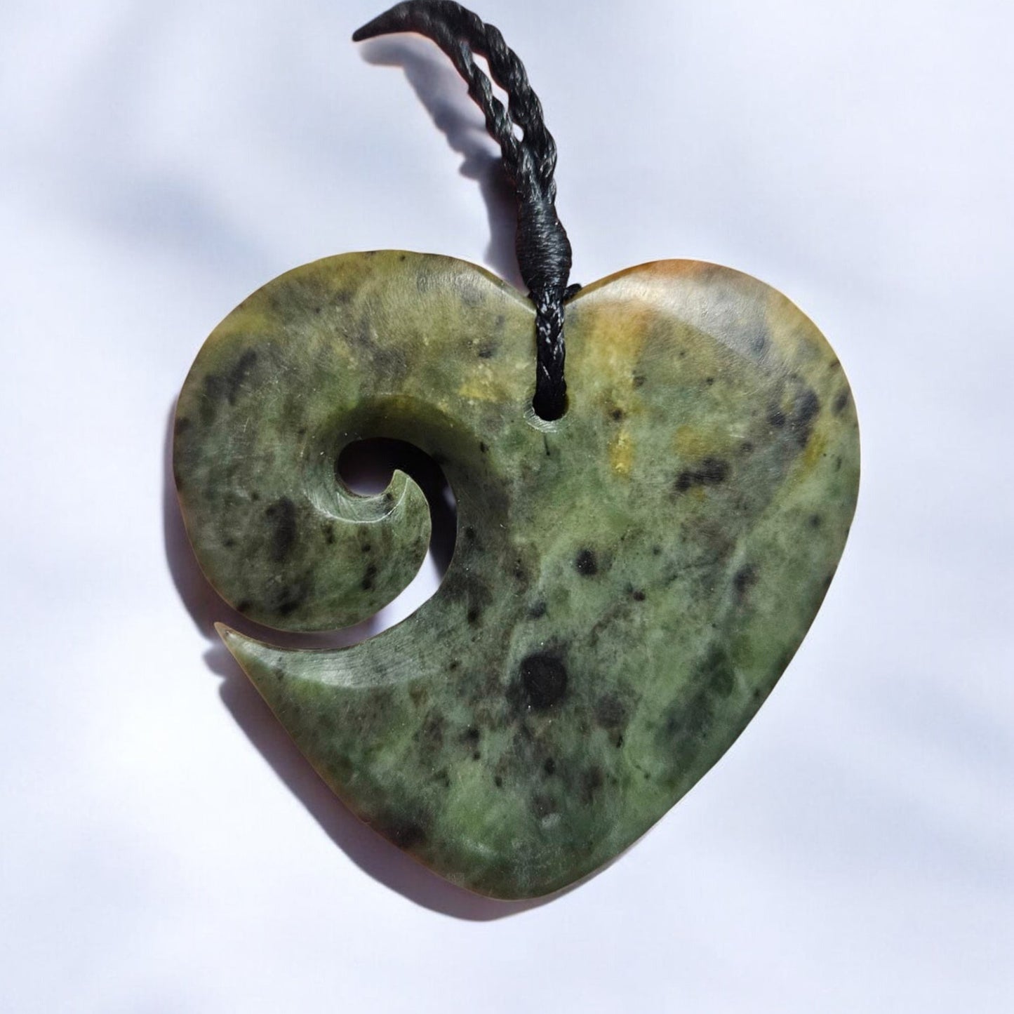 Raukaraka Pounamu Manawa/Heart Pendant with Koru Cut-Out - 50mm