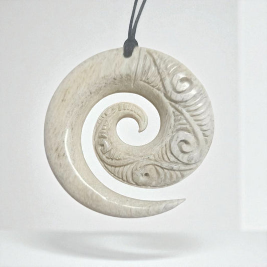 Parāoa Bone Koru Pendant