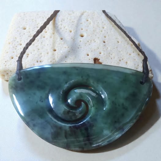 Pounamu Breastplate with Single Koru